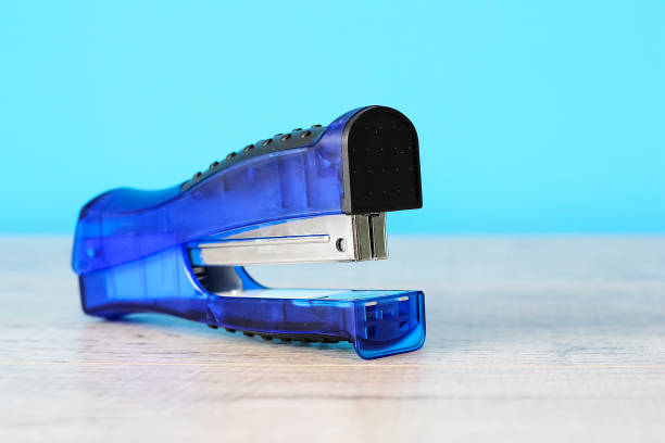 istock Stapler for office work on the table. Stationery item. Office su 938683644