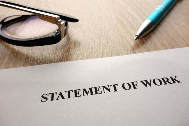 istock Statement of work, pen and glasses 938688100