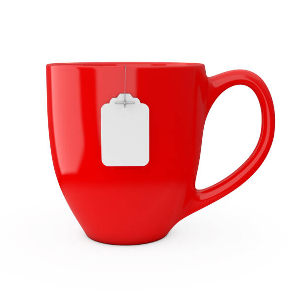 istock Red Cup of Tea with Blank White Tea Bag Label Mockup. 3d Rendering 938688190