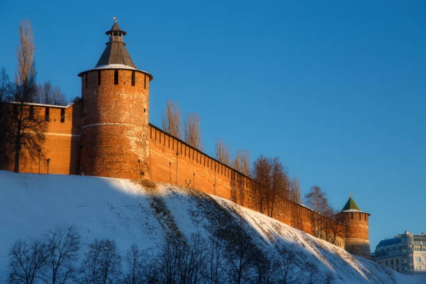 Kremlin wall in Nizhny Novgorod city in Russia at winter sunset Kremlin wall in Nizhny Novgorod city in Russia at winter sunset nizhny novgorod stock pictures, royalty-free photos & images
