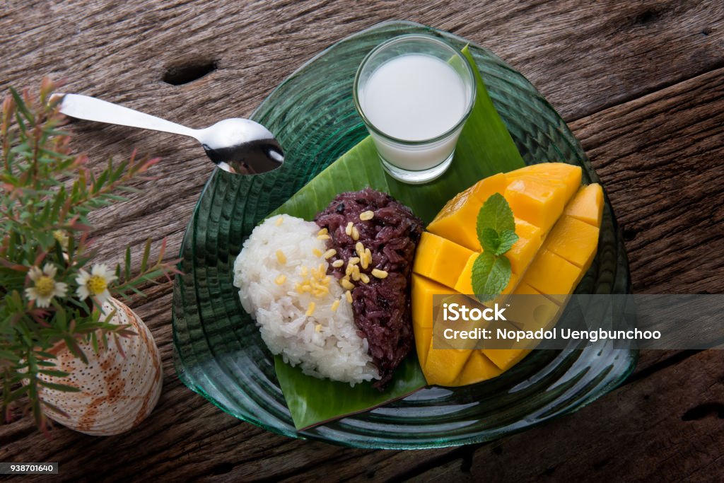 Mango with sticky rice in Thai style dessert. Mango with sticky rice in Thai style dessert of summer time ready to eat . Mango Fruit Stock Photo