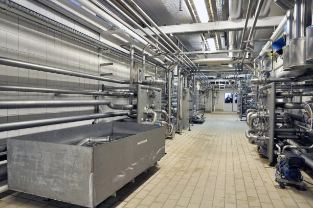 istock interior of a brewery - pipes 938716828