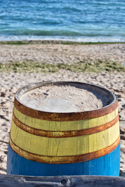 istock Wooden barell at the shore 938733152