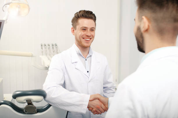 istock Two doctors meeting at the dentist office 938733960