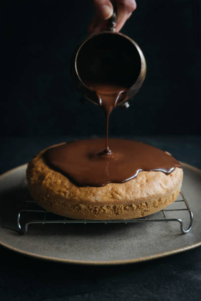 istock Sweet carrot cake glazed with chocolate 938736792