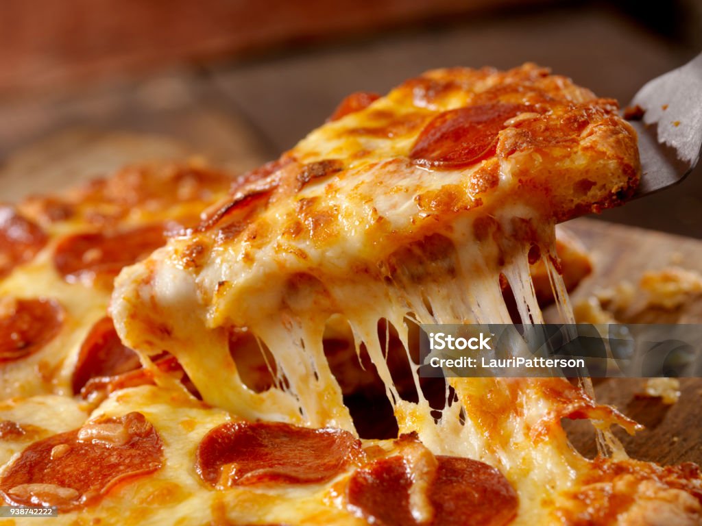Cheesy Pepperoni Pizza Cheesy Pepperoni Pizza Pull Pizza Stock Photo