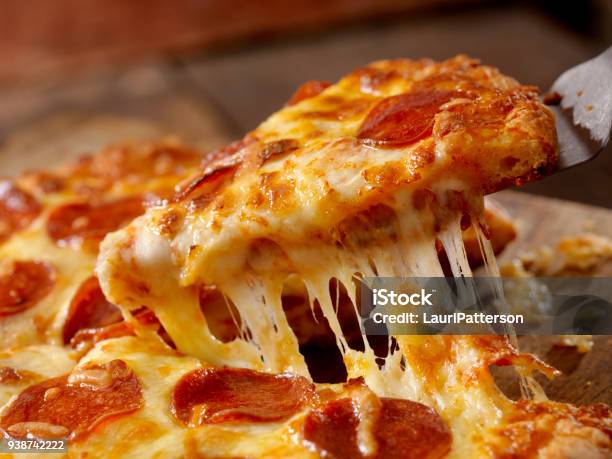 Cheesy Pepperoni Pizza Stock Photo - Download Image Now - Pizza, Cheese, Pepperoni Pizza