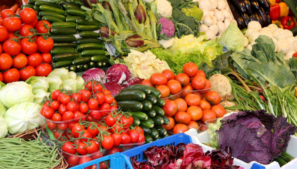 istock fresh vegetables and fruits for sale 938753758