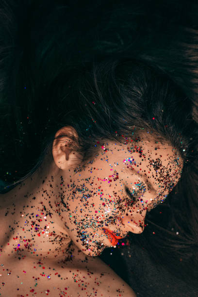 istock High Angle View Of Young Woman With Glittering Face 938753902