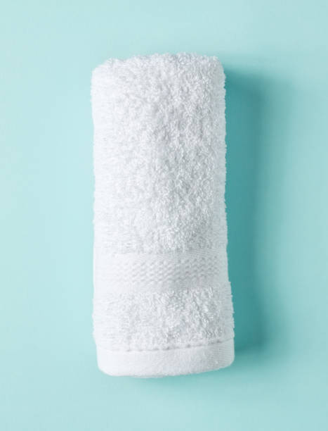 istock White spa towel on blue, from above 938759320
