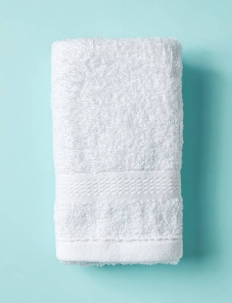 istock White spa towel on blue, from above 938759412