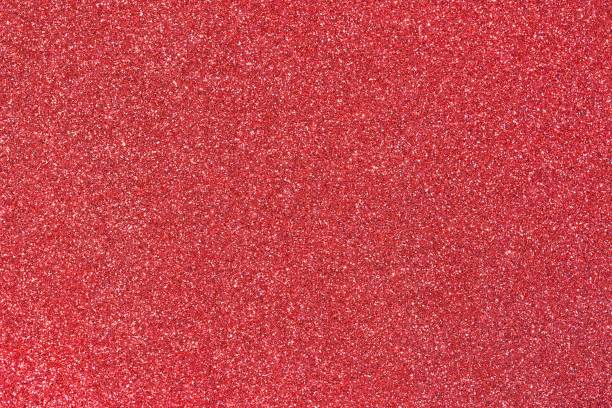 istock shimmering RED background in glittery material ideal as a very bright backdrop 938759476