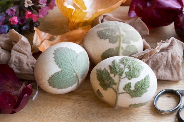 istock Preparation of Easter eggs for dying with onion peels 938759838