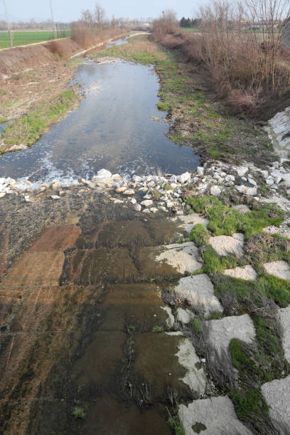istock River called Timonchio in Northern Italy 938760062