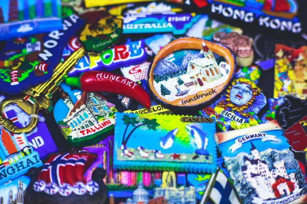 istock Many different travel magnet souvenirs on the black background 938761016
