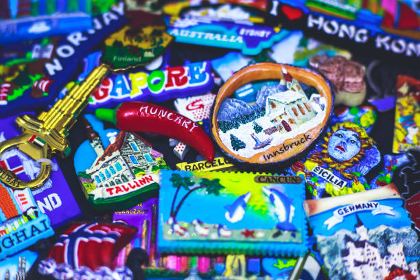 istock Many different travel magnet souvenirs on the black background 938761056