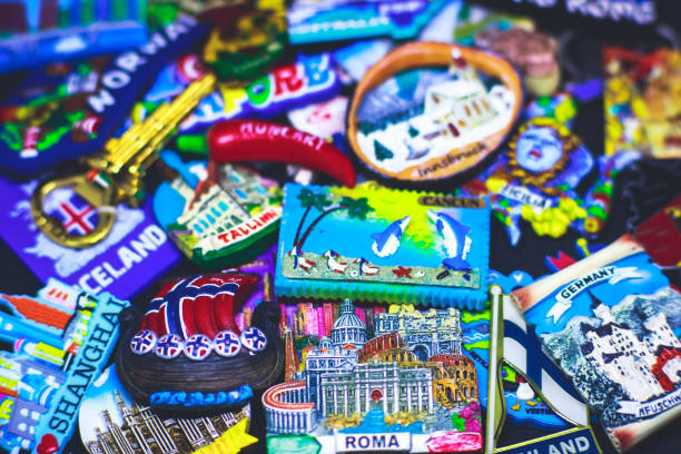 istock Many different travel magnet souvenirs on the black background 938763356