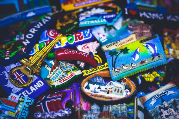 istock Many different travel magnet souvenirs on the black background 938763948