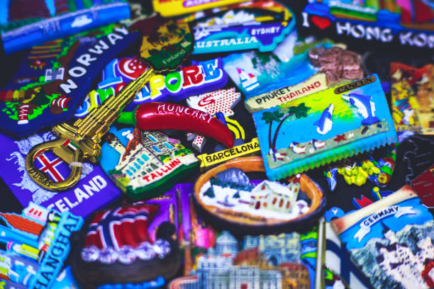 istock Many different travel magnet souvenirs on the black background 938763962