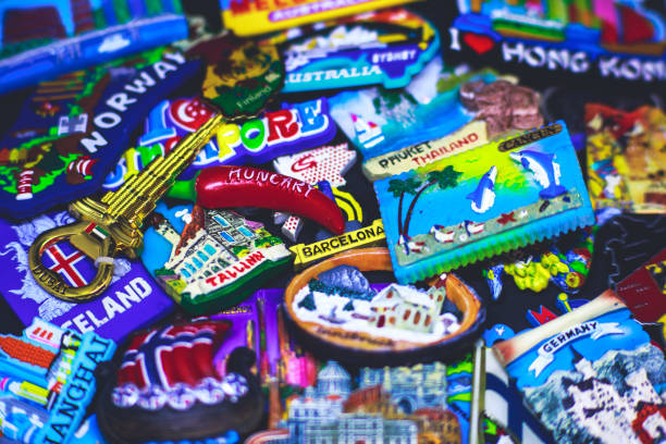 istock Many different travel magnet souvenirs on the black background 938764056