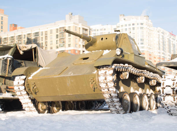 istock vintage old tank on snow in winter 938764404