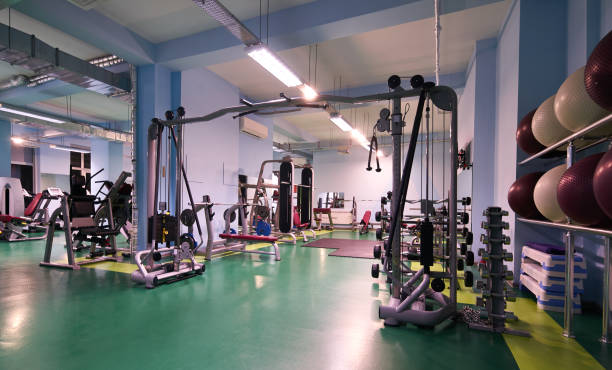 istock Modern gym interior with sports equipment 938765374