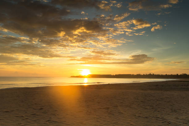 istock sunset over ocean on tropical island 938769810