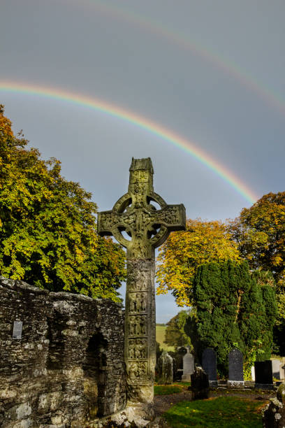 istock Celtic Cross and Rainbow, Monasterboice, Ireland 938770884