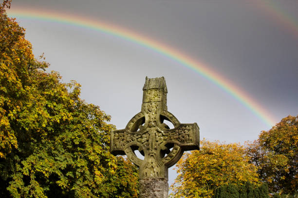 istock Celtic Cross and Rainbow, Monasterboice, Ireland 938770920