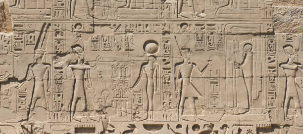 istock old egypt hieroglyphs carved on the stone 938778094