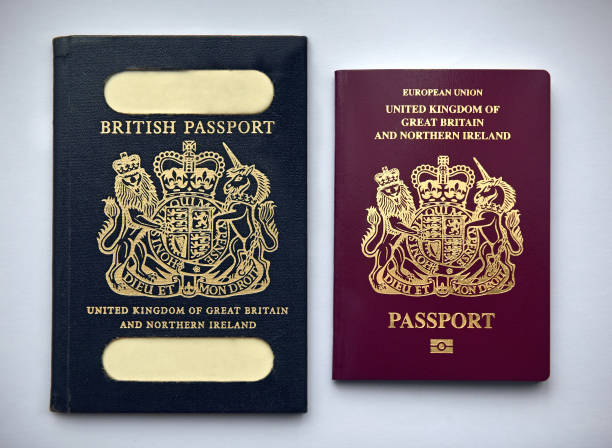 UK passports vintage and current A vintage navy blue UK passport from the 1980's along side a current burgundy UK/EU passport
Britain is leaving the European Union (Brexit) and returning to "blue" coloured passports - this has caused much debate in the UK british culture stock pictures, royalty-free photos & images