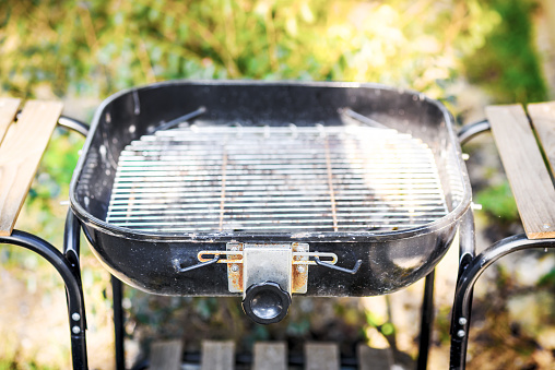 Empty Barbaque Close Up Empty Barbecue Grill In The Backyard Lawn At Sunset Stock ...