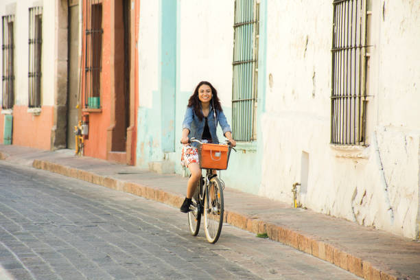 istock Woman cycling 938785810