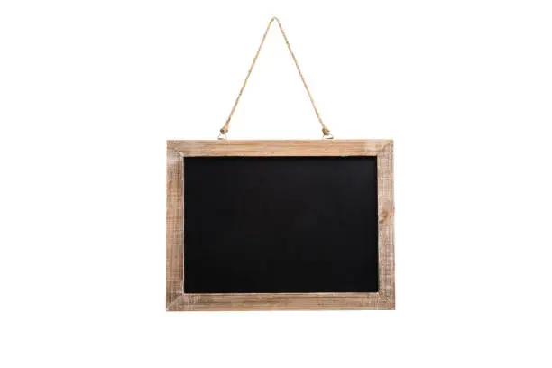 Blank vintage chalkboard with wooden frame and rope for hanging, isolated on white background