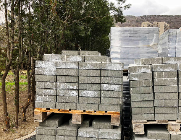 istock Cement tile blocks on the street for building. 938786718