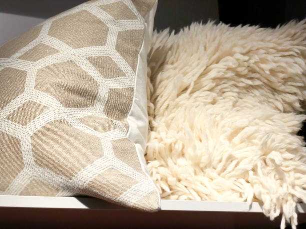 istock Soft colored pillows sold in the store. Stylish soft pillows. 938789600
