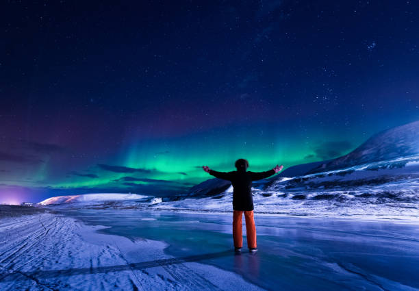 arctic northern lights aurora borealis sky star in norway svalbard in longyearbyen city  mountains - tromso fjord winter mountain imagens e fotografias de stock