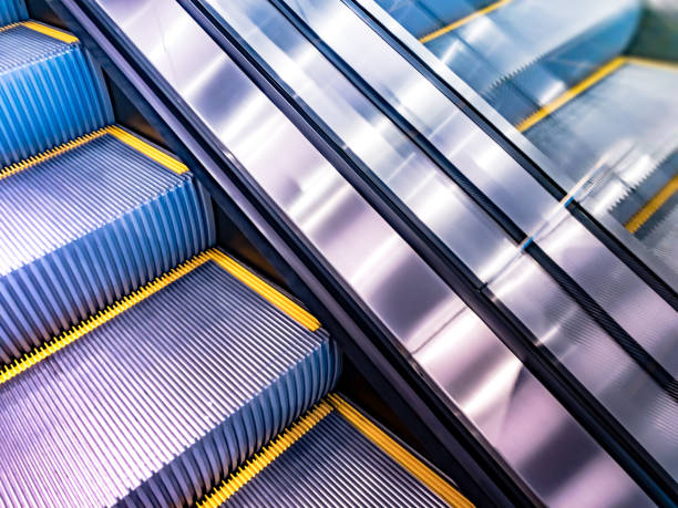 istock A new and shiny escalator in a modern building. 938796106