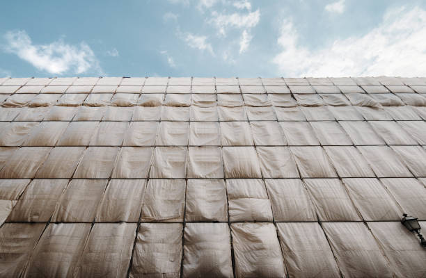Construction site: a building is wholly covered by safety nets