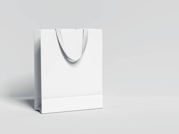 White blank shopping bag. 3d rendering White blank shopping bag isolated on bright background. 3d rendering bag stock pictures, royalty-free photos & images
