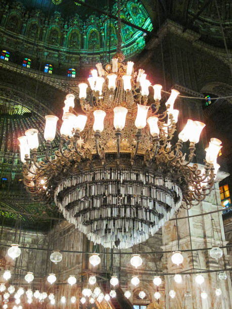 Chandelier at the Mosque of Muhammad Ali in Cairo, Egypt Chandelier at The Great Mosque of Muhammad Ali Pasha in Cairo, Egypt. ept stock pictures, royalty-free photos & images