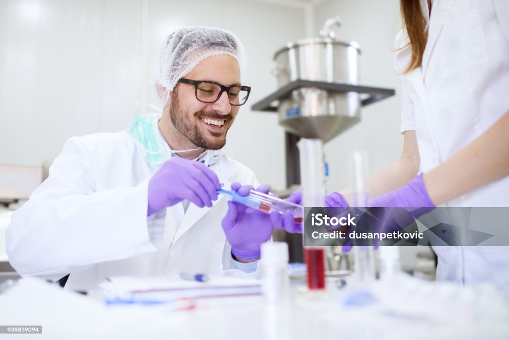 Lab Tech With A Patient Laboratory Telaboratory Technician Doing Blood Analysis With His Female ...