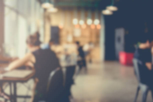 istock blur image background of office or co working space with people 938848676