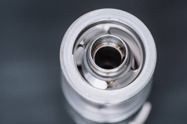 vape smoking an electronic cigarette, runs vape juice electronic cigarette. He holds a mechanical mod