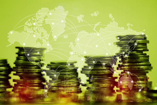 istock Double exposure of coin stack with city background and world map, financial graph, world map and global network business concept. 938849348