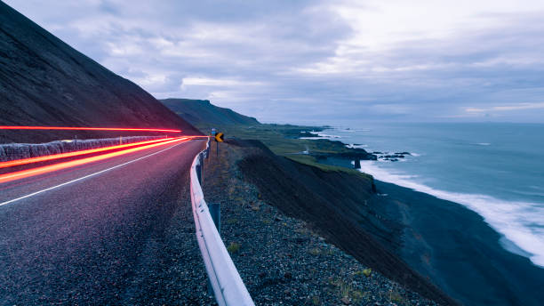 istock Light trails at dusk on Icelandic highway 938861608