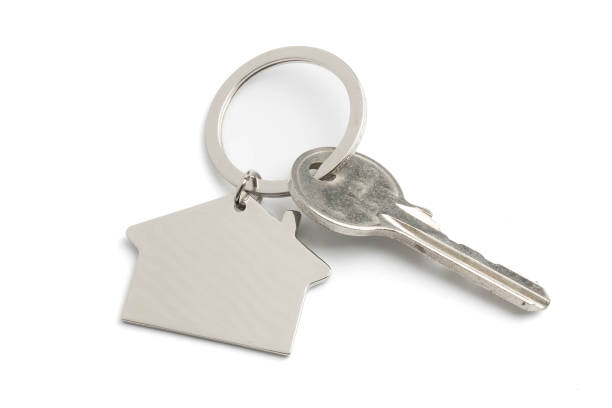 istock house key  isolated on white background 938862570