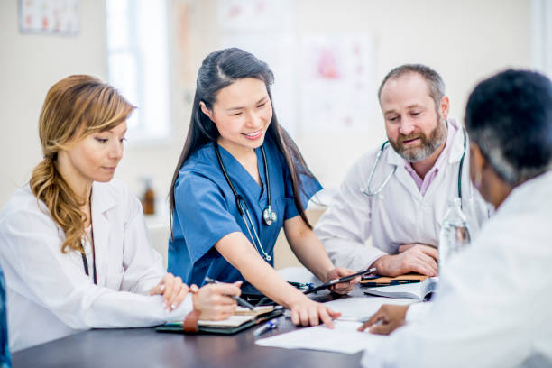 istock Group Of Doctors Having A Meeting 938863818