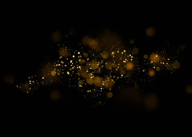 Photo of Gold glittering star light and bokeh.Magic dust abstract background element for your product.