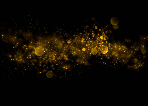 istock Gold glittering star light and bokeh.Magic dust abstract background element for your product. 938870822